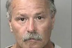 Man arrested for killing another man in store parking lot