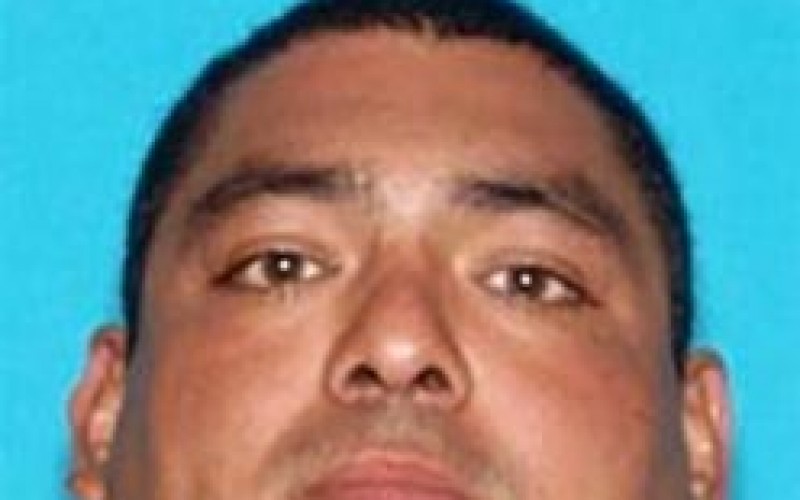 Son Shoots Father in Back