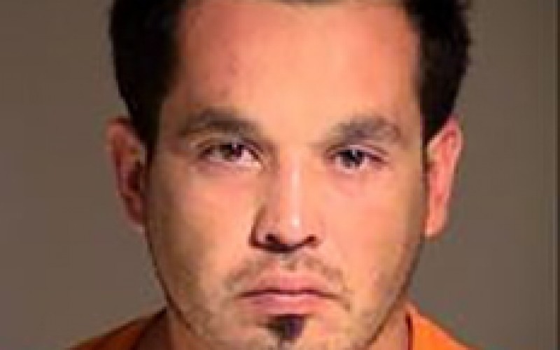 Calls for Help, Then Assaults Cops