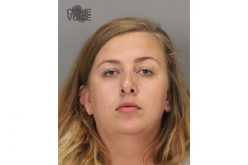 Suspicious woman in parking lot arrested for possession of illegal firearm