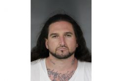 Parolee heads back to jail for domestic violence, drug charges