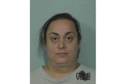 Woman Charged in Immigration Scam
