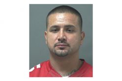 Three arrested in New Year’s Eve murder, one sought