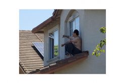 Erratic man gets on roof, rolls off into custody