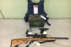 O.R. checkup lands one in jail for guns, another for warrants