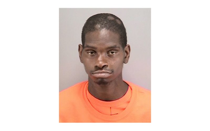 Man throws rock, shatters window, injures woman