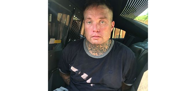 Man Drives Through Closed Garage Door to Unsuccessfully Avoid Arrest