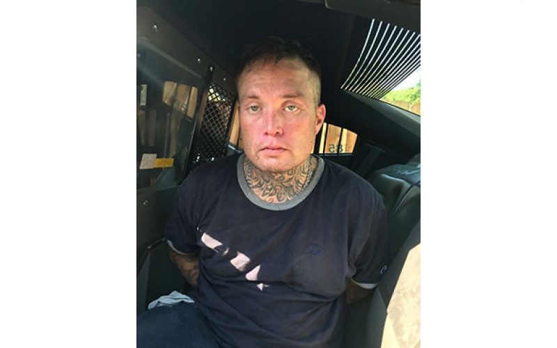 Man Drives Through Closed Garage Door to Unsuccessfully Avoid Arrest