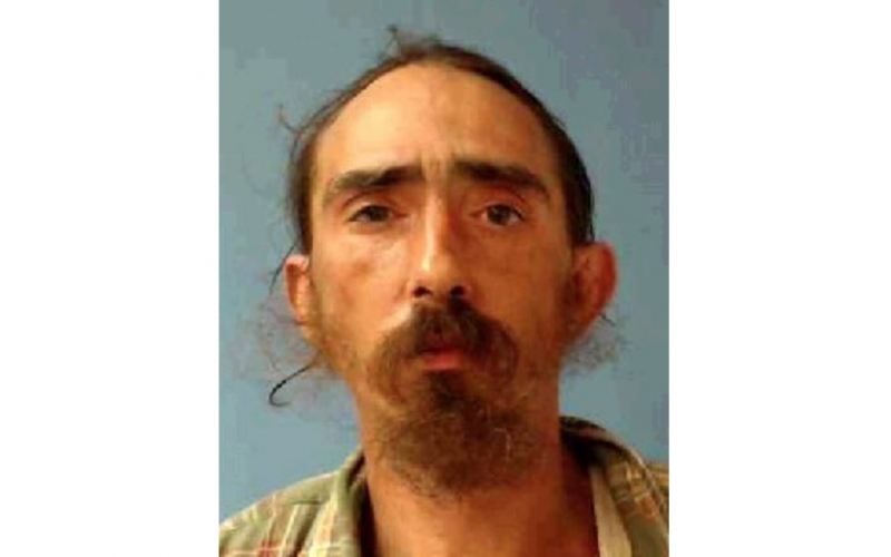Man arrested on suspicion of setting fire in liquor store parking lot