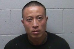 Man arrested after fire he set to keep warm spreads out of control