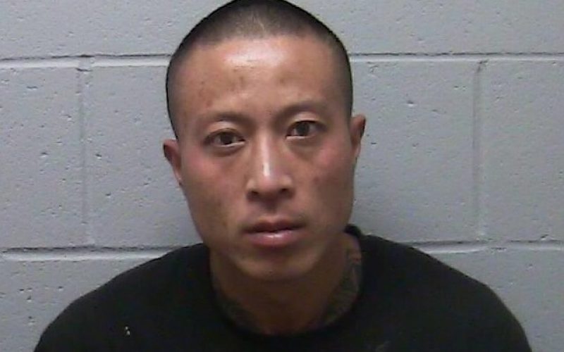 Man arrested after fire he set to keep warm spreads out of control