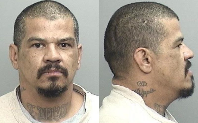 Angry man takes it out on girlfriend, police officer