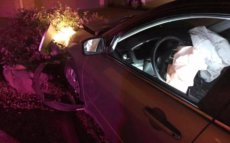 Two men briefly run away after their car wrecks a parked car