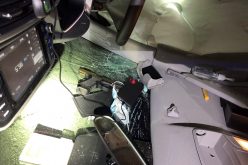 DUI Rollover Collision Yields Gun and Two Arrests
