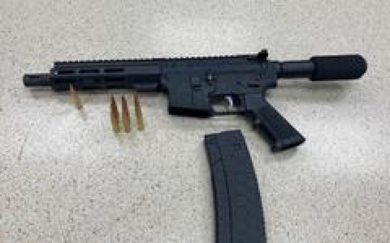 Modified loaded AR-15 with one in the chamber