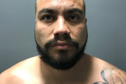 Man with two active warrants eventually comes out of the house