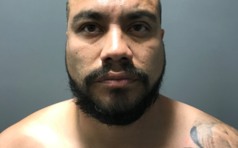 Man with two active warrants eventually comes out of the house