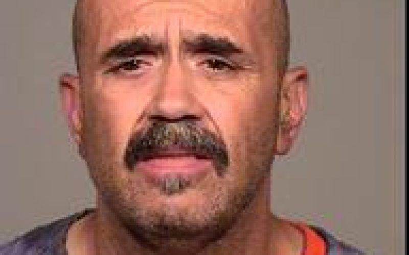 Arrested While Driving with Woman Stuffed in Car’s Trunk