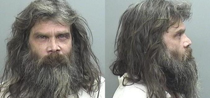 Man assaults wife, ambulance personnel, and officers