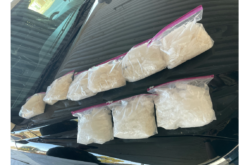 Kings County man, passenger arrested after reportedly being caught with unrestrained child and drugs in car