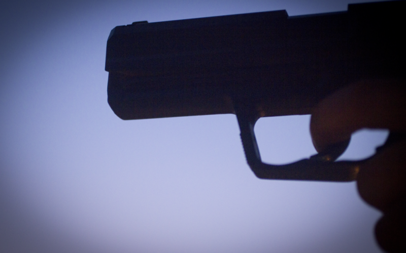 Woman Arrested after School Receives Messages Threatening Gun Violence