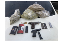 Motorist Arrested After Unregistered Guns, Four Pounds of Cannabis Allegedly Found During Traffic Stop