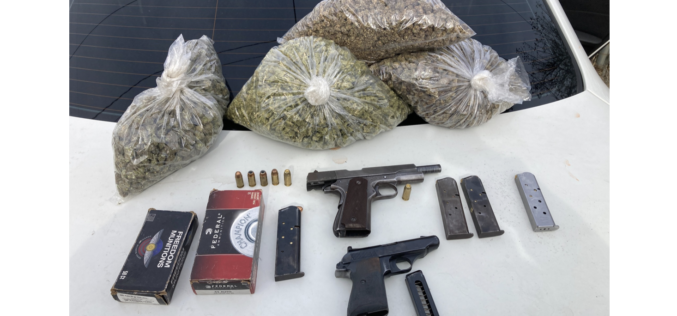 Motorist Arrested After Unregistered Guns, Four Pounds of Cannabis Allegedly Found During Traffic Stop
